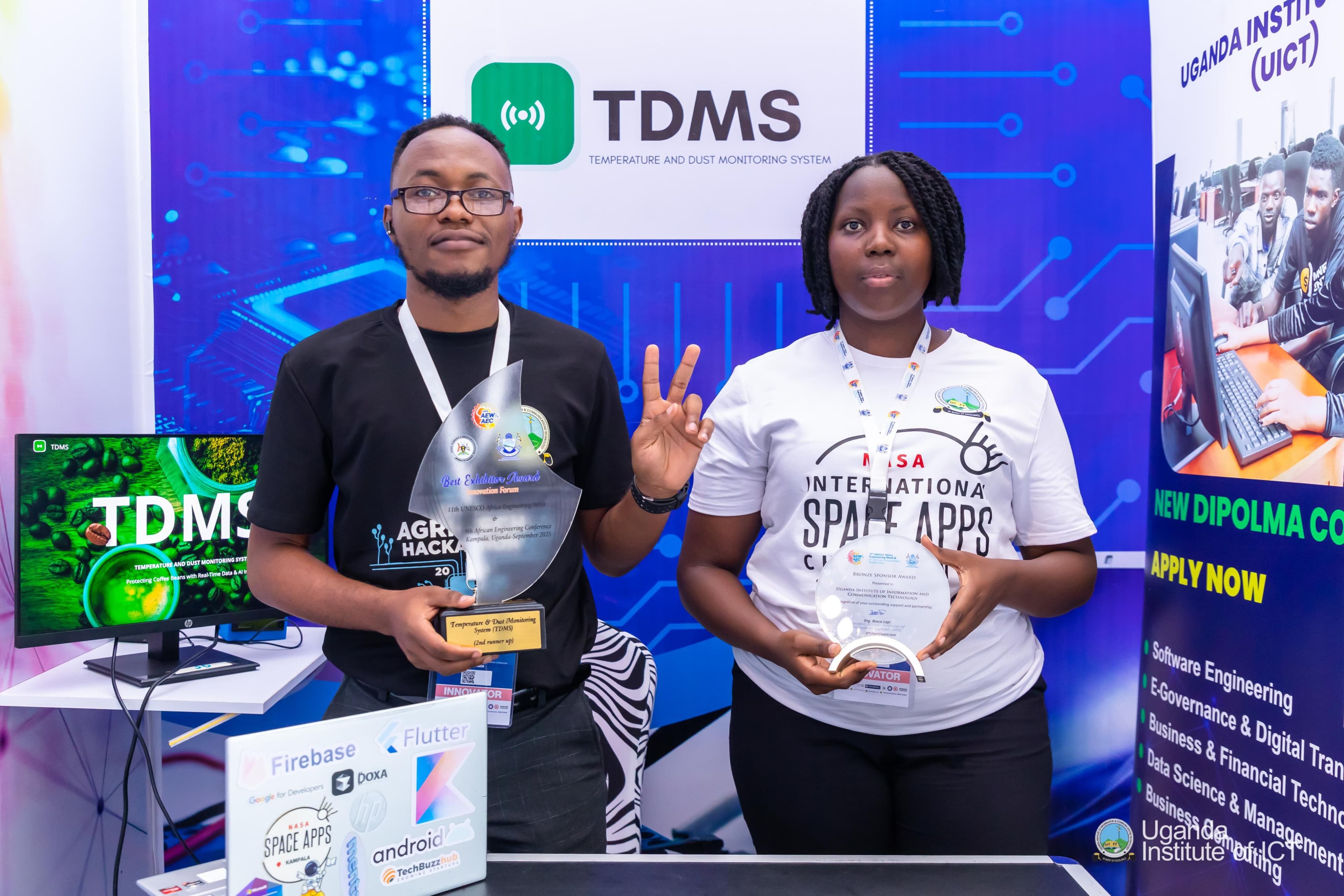TDMS team proudly displaying awards